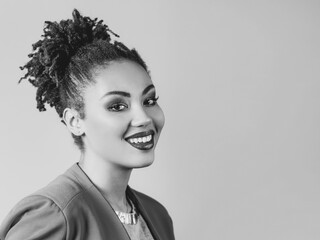 beautiful attractive cheerful smiling young woman (mixed rase) showing her love. Love, support, togetherness, care, diversity concept