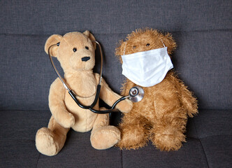 Two Teddy Bears like doctor and a patient