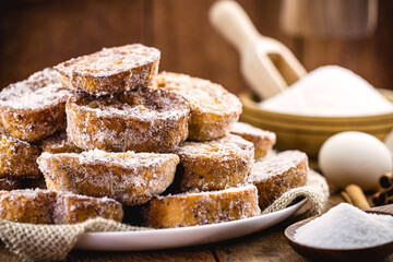 Bread dessert known as gold slice, lamb slice, french toast, Eggy bread, french toast, “Pain Perdu”. Around ingredients, like sugar and egg
