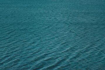 Blue water surface with waves texture