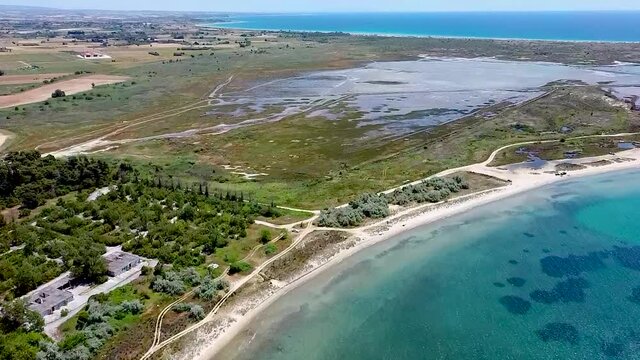Aerial view of idyllic beach in the area of Thessaloniki, Greece, bottom-up movement by drone