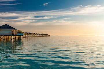 Obraz premium Beautiful summer beach paradise with sandy beach and villas