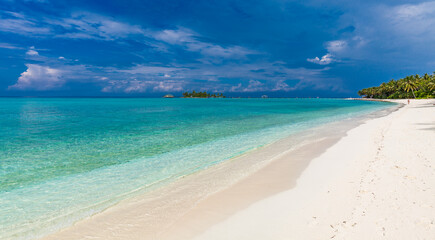 White sandy beach in Maldives with amazing blue lagoon