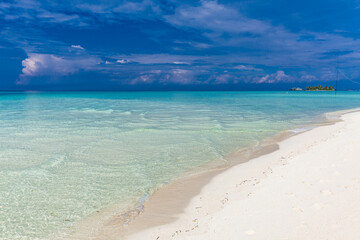 White sandy beach in Maldives with amazing blue lagoon