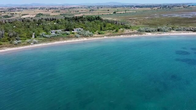 Aerial view of idyllic beach in the area of Thessaloniki, Greece, Aerial view of idyllic beach in the area of Thessaloniki, Greece, forward movement by drone 