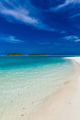 White sandy beach in Maldives with amazing blue lagoon