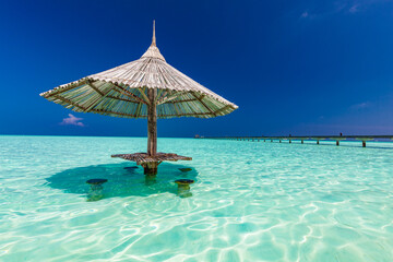 Beautiful summer beach paradise with sandy beach and villas