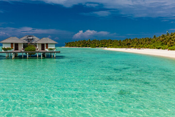 White sandy beach in Maldives with amazing blue lagoon