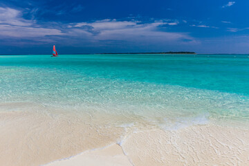 White sandy beach in Maldives with amazing blue lagoon