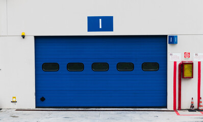 Closed motor sport box workshop number one front view from pit lane