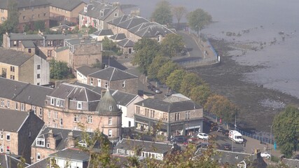 Fototapeta na wymiar Panoramic view over Gourock from Lyle Hill. Low lying mist over houses. 
