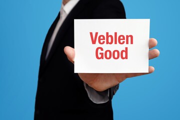 Veblen Good. Businessman in suit showing business card with text. Man isolated on blue background