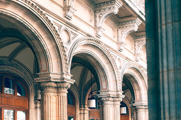 Architecture Arches in Baroque Style . Details of architectural arches and columns . Vienna Opera Building  - obrazy, fototapety, plakaty