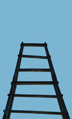 Old wooden ladder leading to a cloud in blue sky. aged Stairway to Heaven. Road To Success....