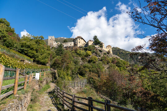 Vertical shot of Juval Castle under blue sky in Italy