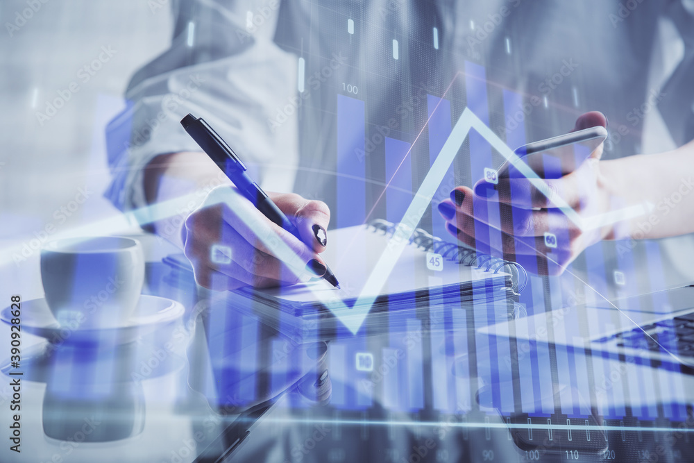Poster double exposure of financial graph sketch hologram and woman holding and using a mobile device. stoc
