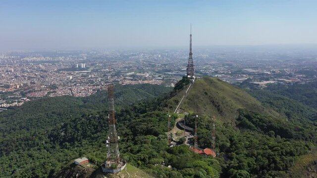 Antenna at the peak of the hill scene. Pico do Jaragua, Sao Paulo, Brazil. Antenna at the peak of the hill scene. Pico do Jaragua, Sao Paulo, Brazil. Antenna at the peak of the hill scene. 