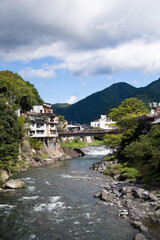 Fototapeta na wymiar Yoshida River seen from Miyagase Bridge, Gujo City, Gifu Prefecture