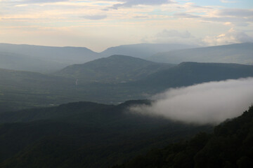 Obraz na płótnie Canvas layers of mountains with fog