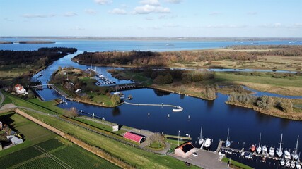 Fototapeta na wymiar Harbor at the Benedensas and de Heen in the Netherlands located on the Volkerak on the Steenbergsche Vliet.