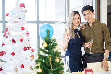 Valentine's Day. Beauty asian girl and man with red heart box present and balloons having fun.