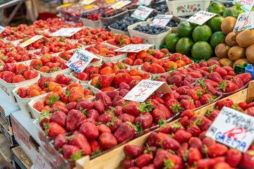 Wrocław Market Hall, Classic early 20th-century building with vendors selling fresh fruit, meat, baked goods & more.