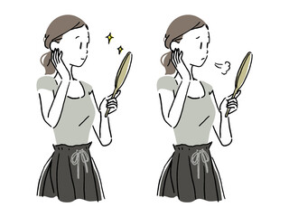 Woman looking in a hand mirror 1