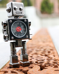 Toy robot standing on gear shaped grates at Riverfront Park