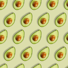 Avocado pattern on light green background. seamless pattern.