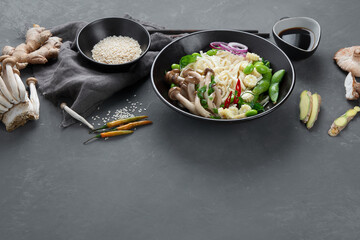 Udon noodles with mushrooms and vegetables