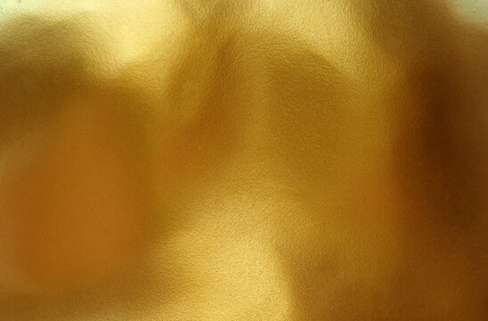Gold foil colorful abstract background. - Powered by Adobe