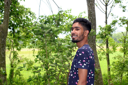 the teenager costs on a footpath in the wood