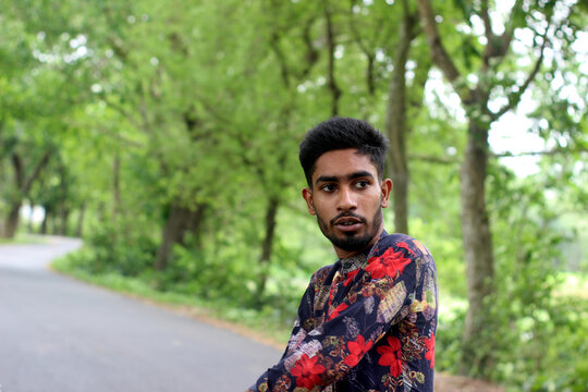 the teenager costs on a footpath in the wood