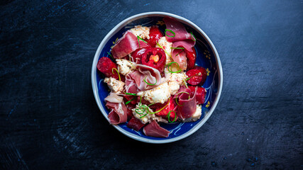 Tomato mozzarella salad with prosciutto