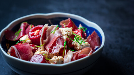 Tomato mozzarella salad with prosciutto