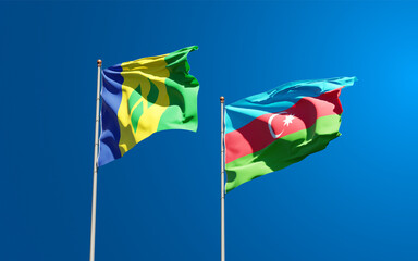 Beautiful national state flags of Saint Vincent and the Grenadines and Azerbaijan together at the sky background. 3D artwork concept.