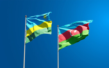 Beautiful national state flags of Rwanda and Azerbaijan together at the sky background. 3D artwork concept.