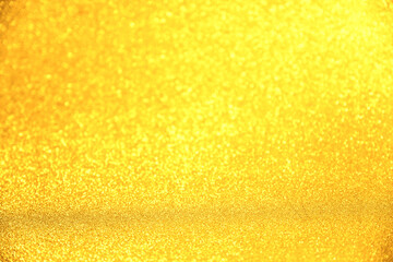 Luxury gold glitter texture with bokeh as background, de-focused. concept for studio backdrop , chrismas , holiday , happy new year , decoration.