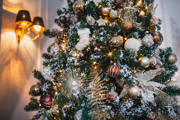 Christmas tree with Christmas toys, lights and garlands