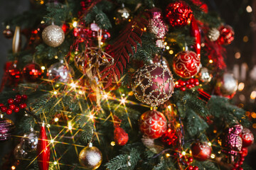 Christmas tree with Christmas toys, lights and garlands