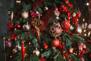 Christmas tree with Christmas toys, lights and garlands