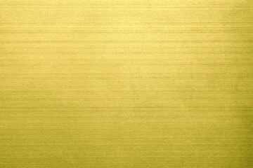 Fototapeta premium Texture of gold stainless steel background or gold line polished metal with light reflection.