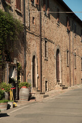 View of Bolgheri.
view of old street in bolgheri village, tuscany italy.
