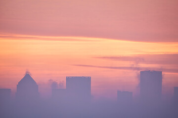 Majestic lamndscape image of sunrise over London cityscape with stunning sky formations over iconic landmarks