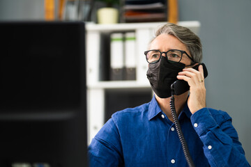 Business Man Talking On Phone Or Telephone