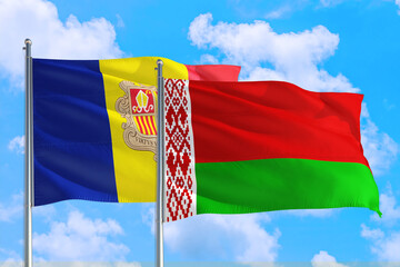 Belarus and Andorra national flag waving in the windy deep blue sky. Diplomacy and international relations concept.