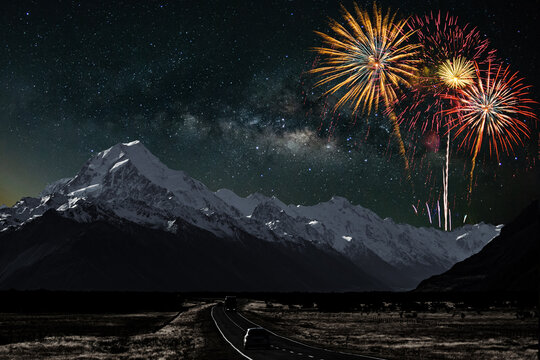 Colorful of fireworks display on milkyway in night sky background.