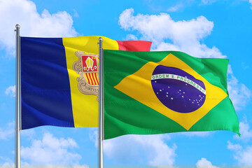 Brazil and Andorra national flag waving in the windy deep blue sky. Diplomacy and international relations concept.