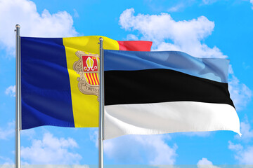 Estonia and Andorra national flag waving in the windy deep blue sky. Diplomacy and international relations concept.