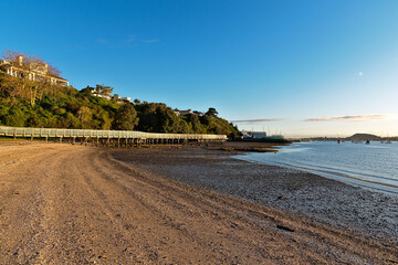 Wooden walkway from Buacklands Beach to Half Moon Bay Marina in Auckland